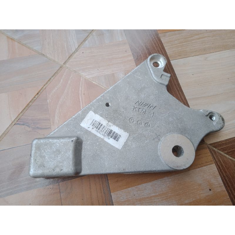 breket bracket kaliper rem belakang original AHM Honda new blade Supra x 125