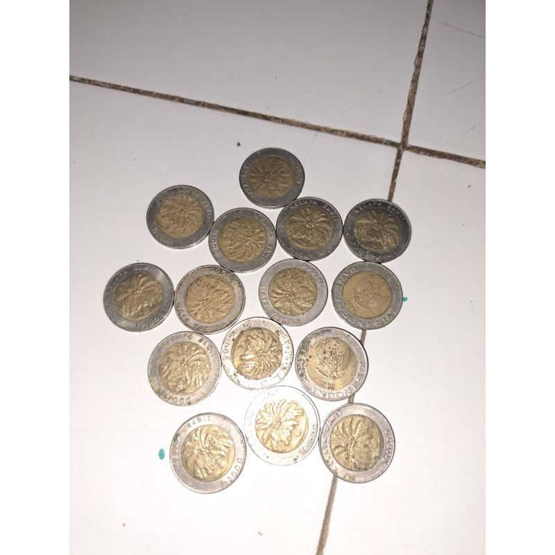 uang koin 1000 kelapa sawit asli