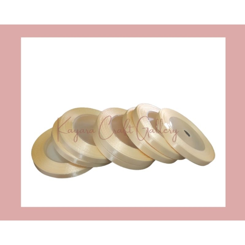 

pita satin kecil termurah per rol 1/4 inchi KREM