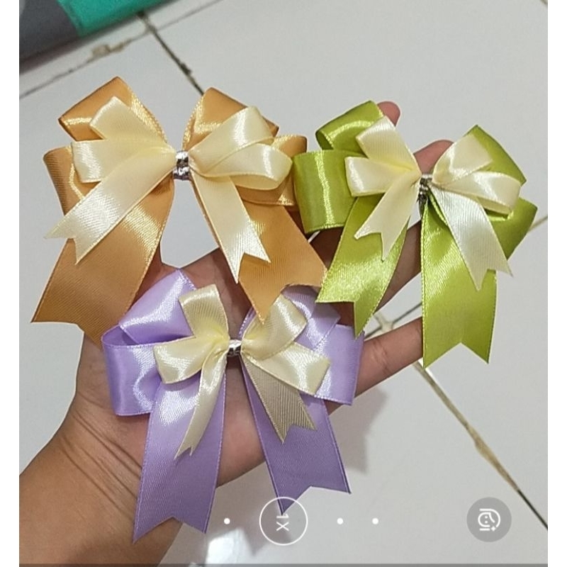 

pita, pita hampers, pita kado, pita satin, pita tumpuk, pita souvenir