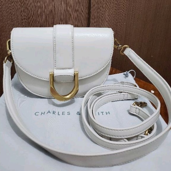 original charles & keith mini gabine saddle bag cream mini S