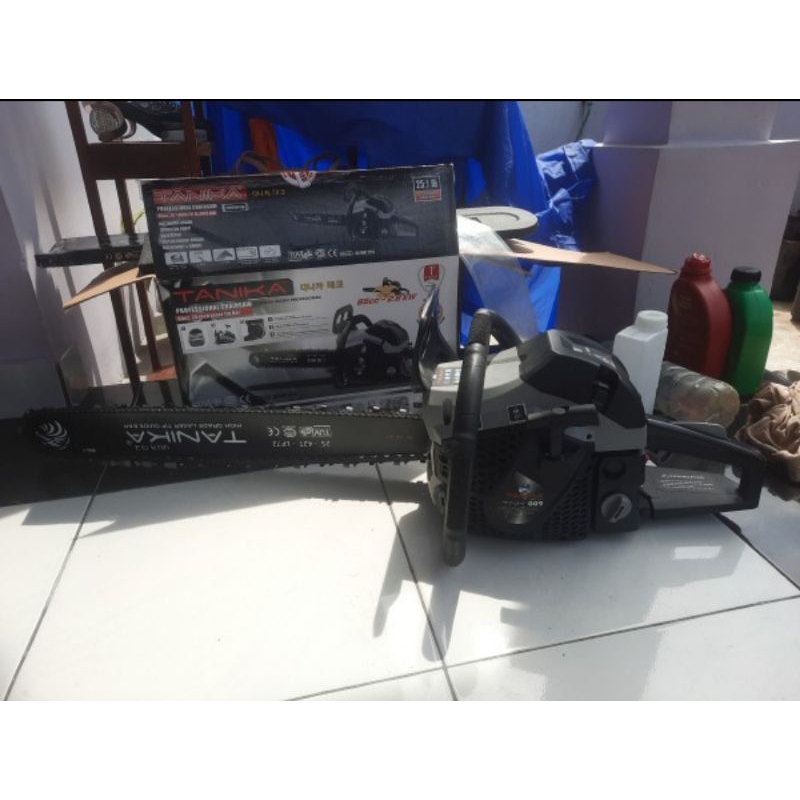 chainsaw tanika 009 65cc 25"