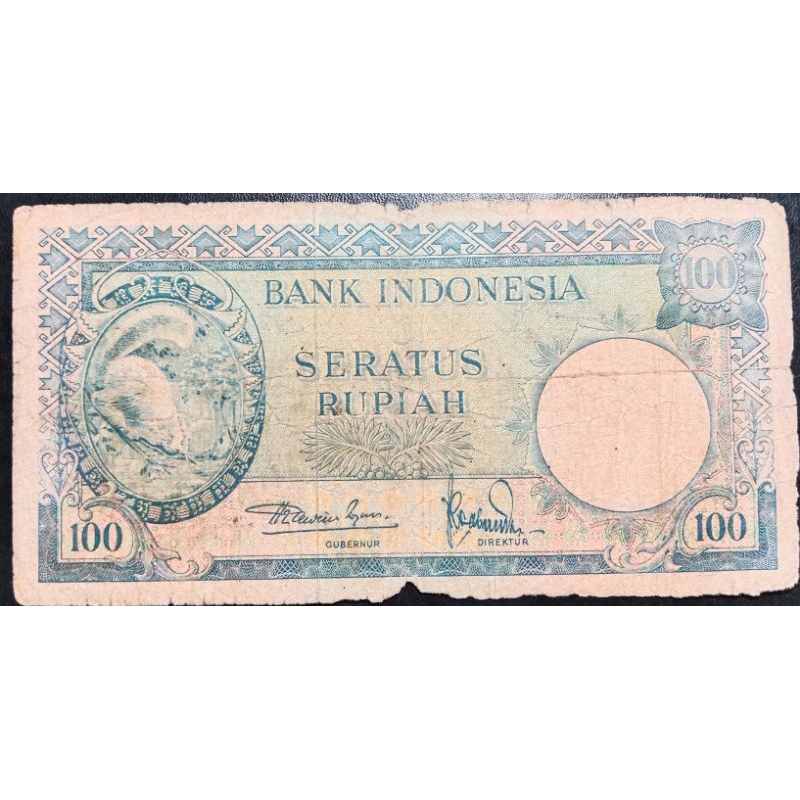 UANGKUNO 100 RUPIAH TUPAI THN 1957