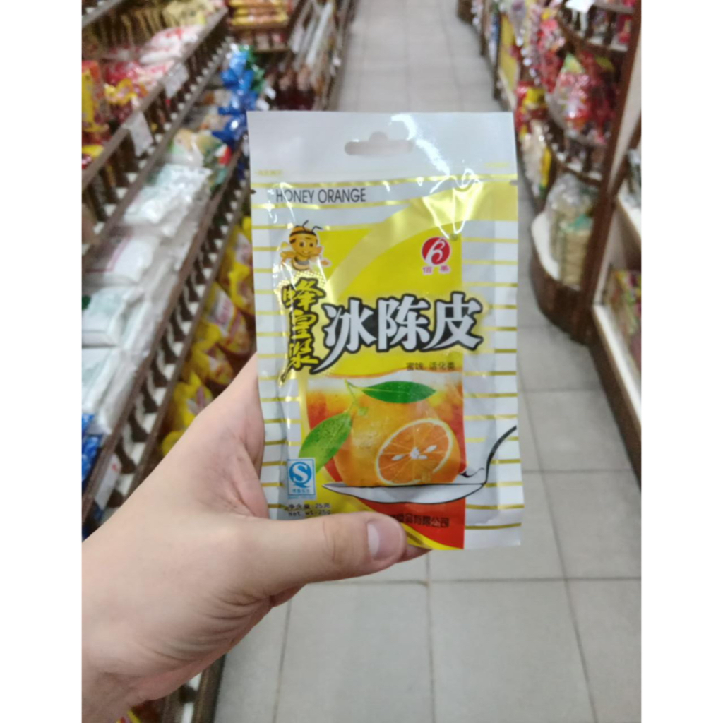 

MANISAN KULIT JERUK HONEY ORANGE BAI GUO 25gr