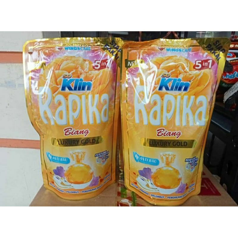 rapika pelicin pewangi pakaian gold 250ml
