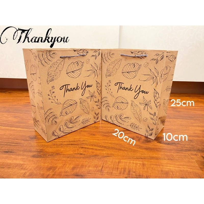 

PAPERBAG COKLAT MOTIF THANK YOU UK 20X10X25 / TAS KERTAS MOTIF THANKYOU / TAS KERTAS COKLAT / GOODIEBAG MOTIF / PAPERBAG MOTIF THANKYOU / PAPERBAG COKLAT