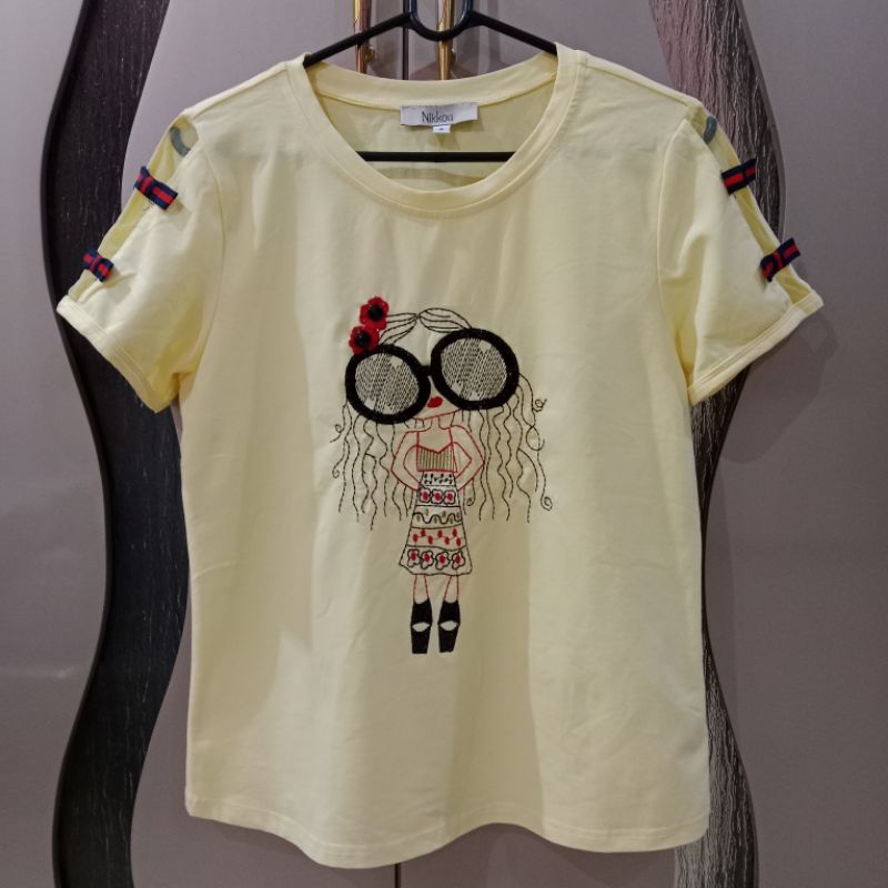 Kaos Blouse Wanita Kuning Bordir Girl Glasses merek Nikkou ukuran S