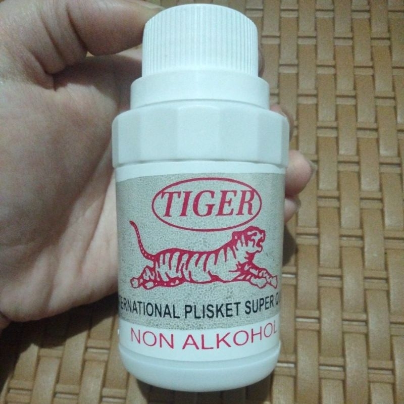Obat Plisket kain/ obat plitsir rok sekolah merk TIGER