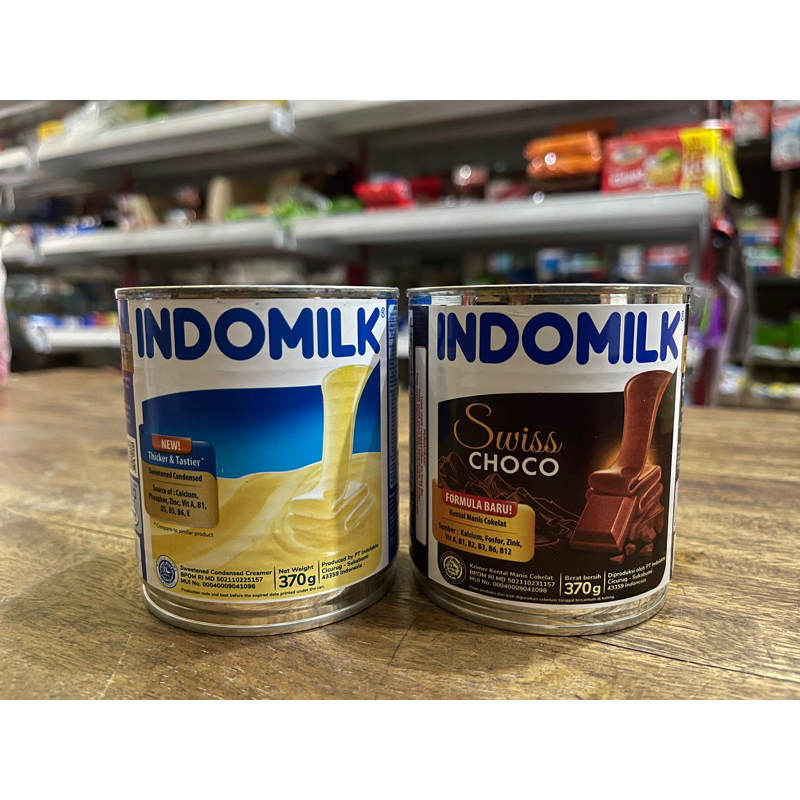 

SUSU KENTAL MANIS INDOMILK KALENG 370 gram VANILA/PUTIH DAN COKELAT