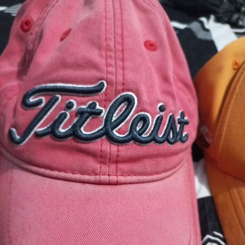 topi golf merek cobra dan titleist original