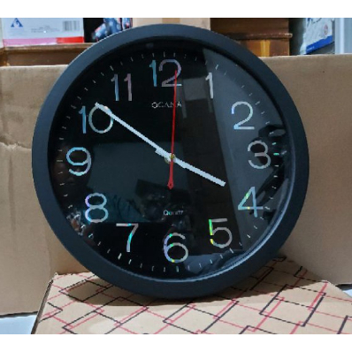 jam dinding merk ogana tipe 8989 model hologram warna htiam