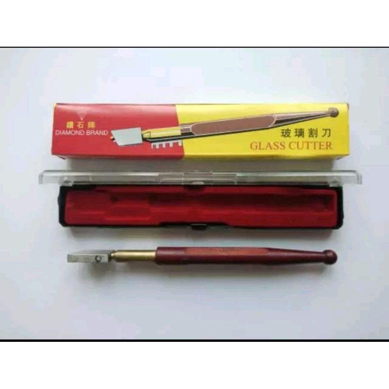 

Alat pemotong kaca ,box, mika pisau potong kaca glass cutter merk diamond