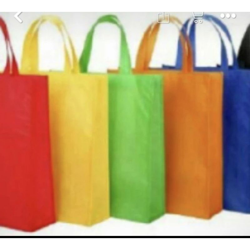 

tas spunbond murah ukuran 30x40x8 isi 12 pcs
