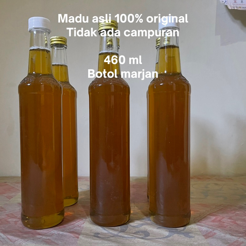 

madu asli kemasan botol 460 ml di panen langsung dari hutan asli dan di jamin 100% murni madu asli