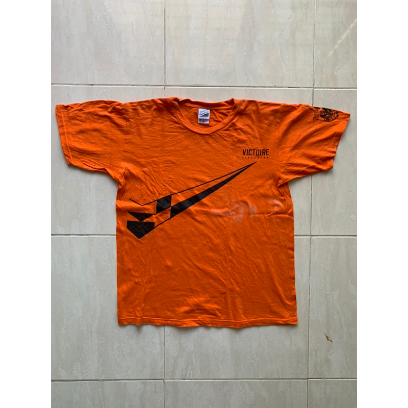 baju kaos katun orange daluc standard jahitan rantai rapi