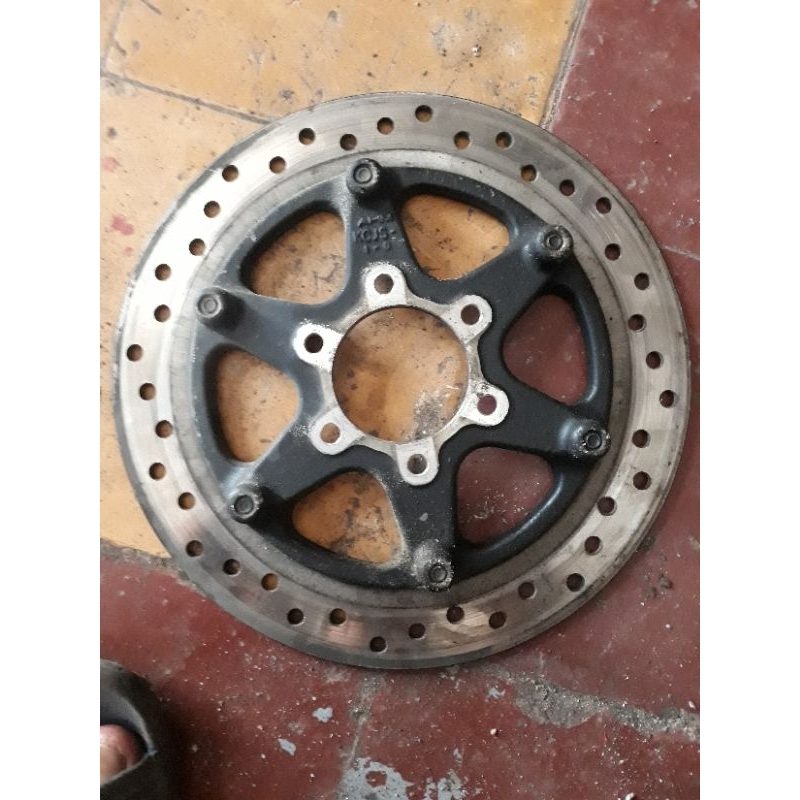 piringan cakram tiger revo original copotan