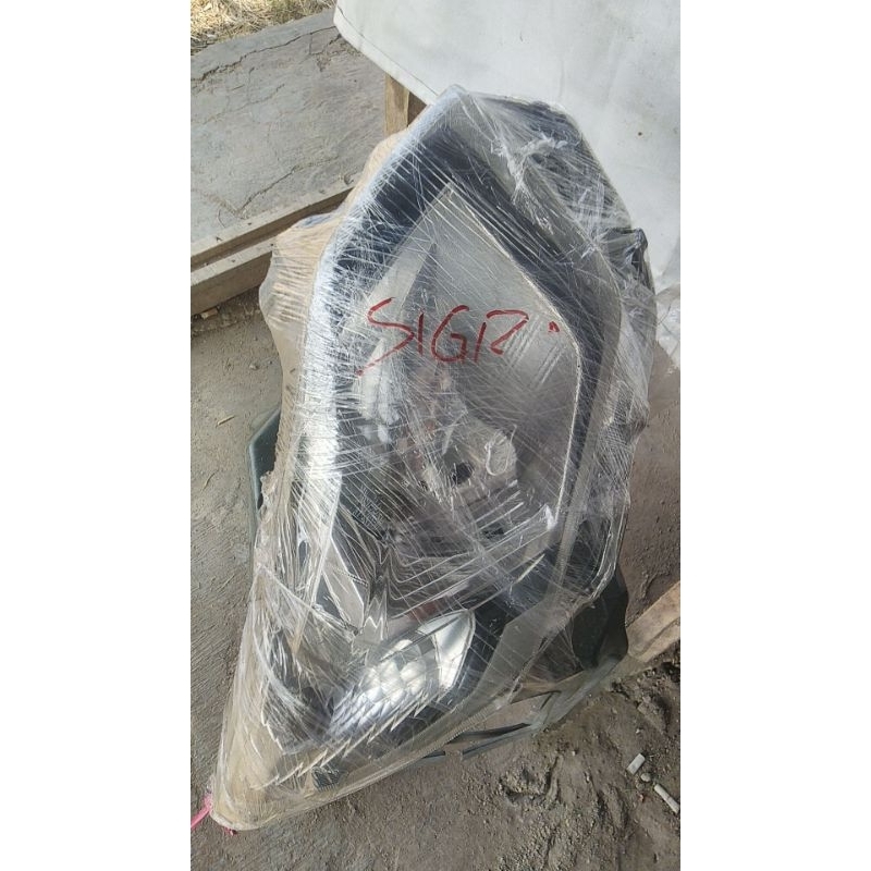 LAMPU DEPAN KANAN SIGRA