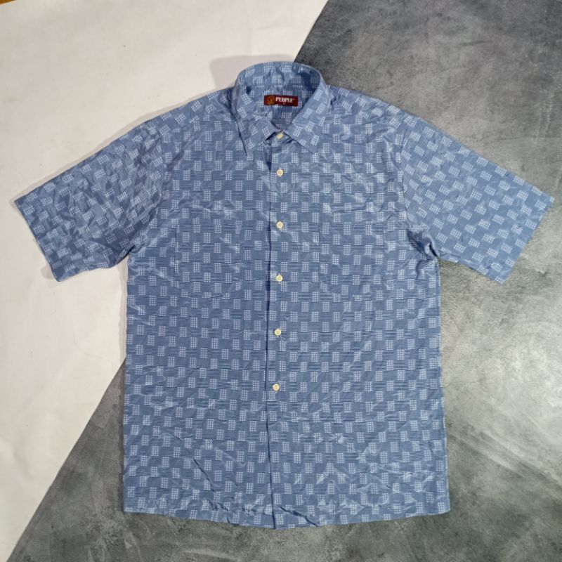 Kemeja motif bekas second