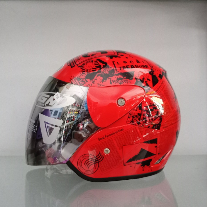 HELM GM EVOLUTION MOTIF NEWS koran Red visor Pelangi Original