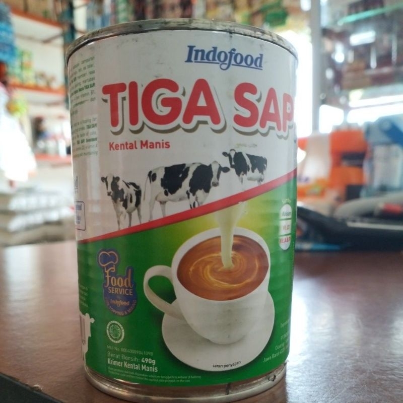 

Tiga sapi susu kental manis