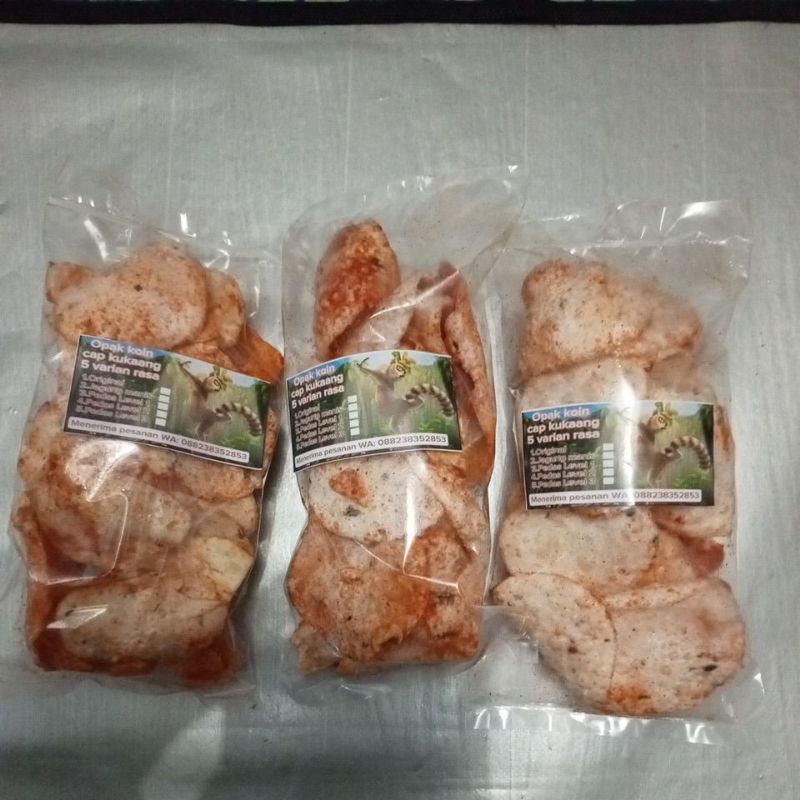 

opak koin cap kukang