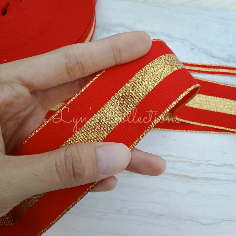 Pita Webbing Merah List Gold