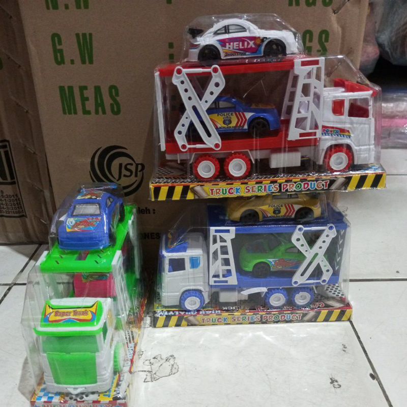 Mainan mobil truk Volvo mika pengangkut mobil balap ST 2081