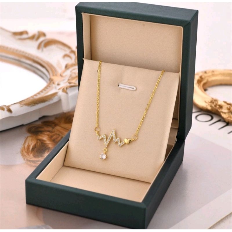 kalung titanium detak jantung