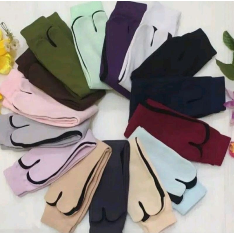 kaus kaki jempol