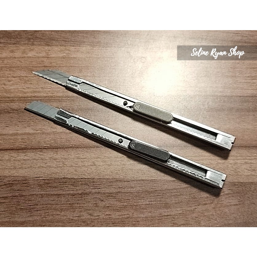 

Pisau Cutter Stainless Kecil Auto-Lock Plus Penjepit Saku