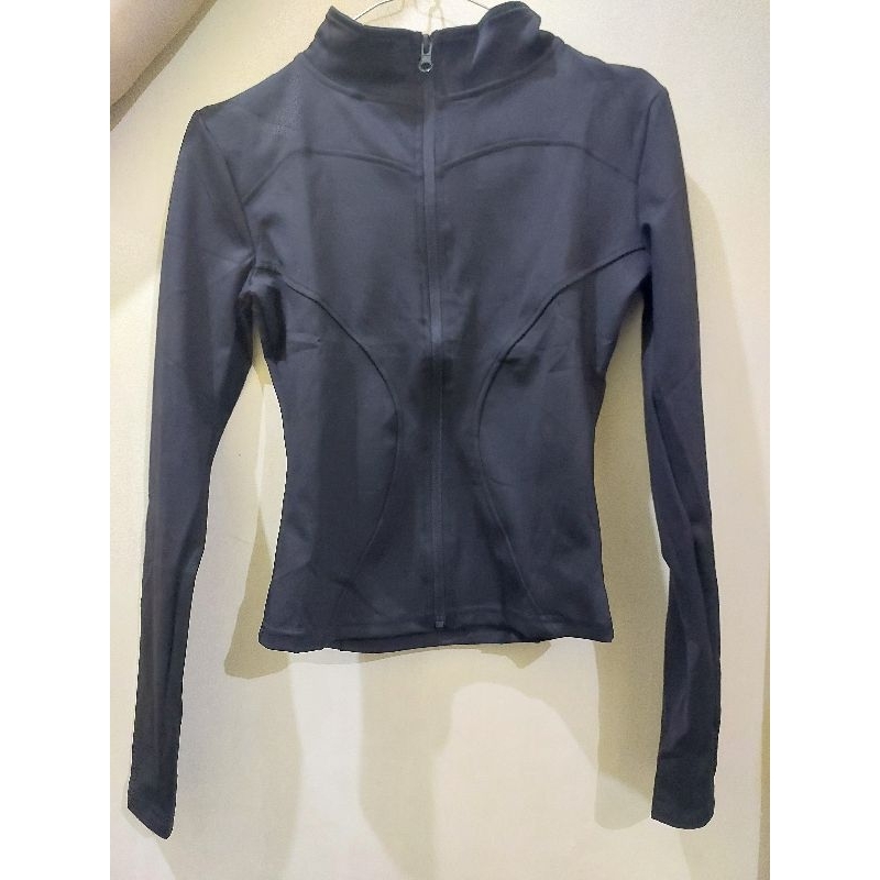 Preloved Reytorm jaket olahraga wanita lengan panjang untuk yoga / fitness sport