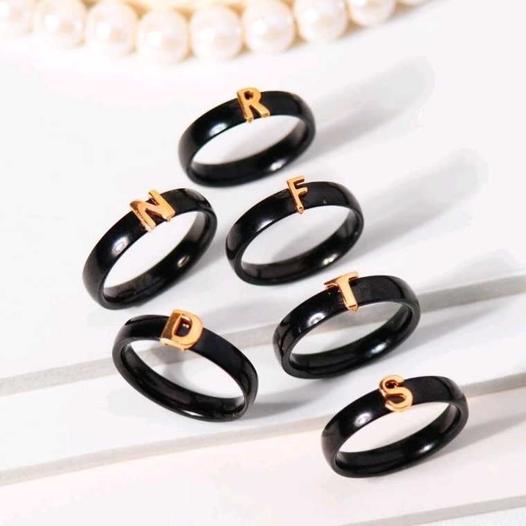 NEWYy5Y9 Cincin Keramik Fashion Emas Huruf K- T ( 8 K ) - Toko Emas Gadjah