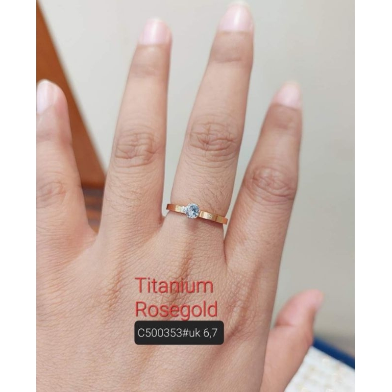 cincin titanium mata satu solitaire cartier