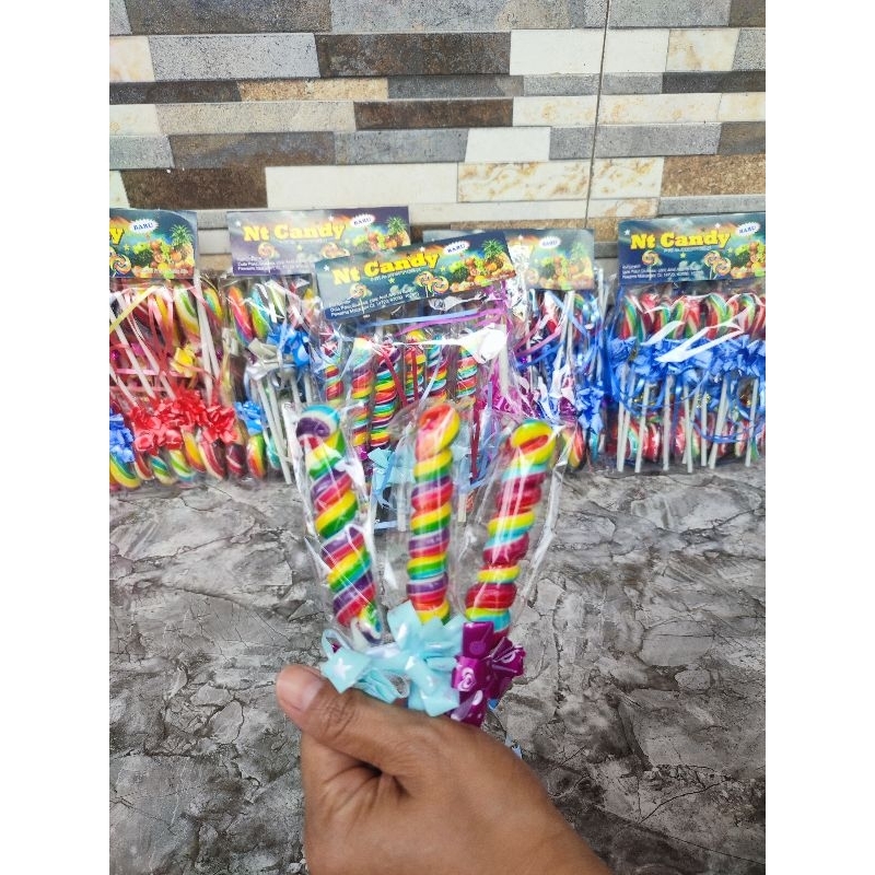 

permen lollipop 4 cm bentuk ulir hadiah pita.premium