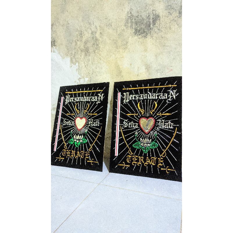 hiasan dinding logo psht