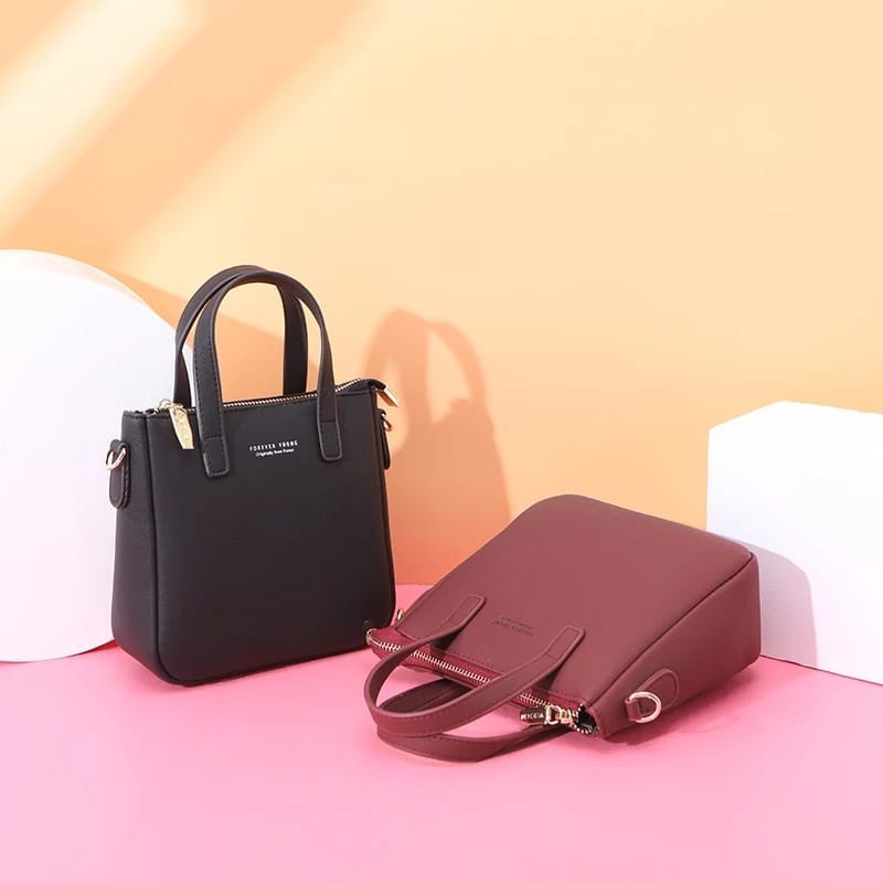 Tasimport.co - Tas wanita multifungsi selempang dan tenteng Raven bahan kulit sintesis uk.20x20