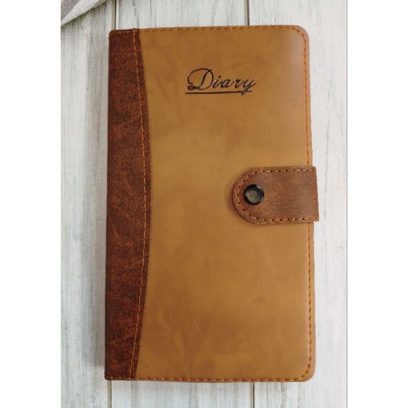 

AGENDA KANCING 7048 KERTAS BERGARIS ISI 75 LEMBAR UK 18X10.5CM