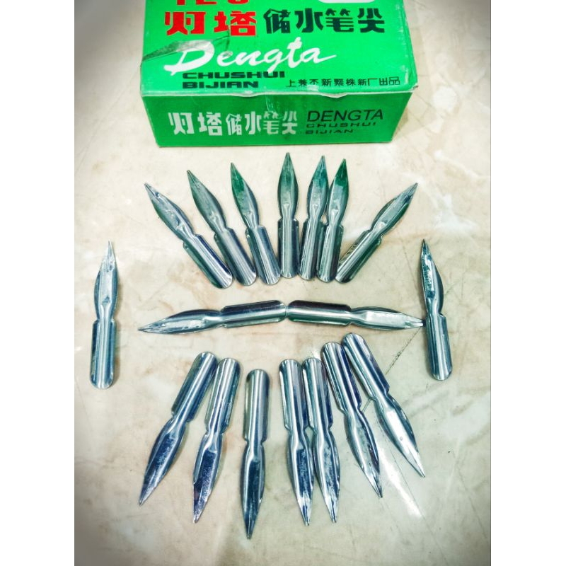 

ujung mata pena totol