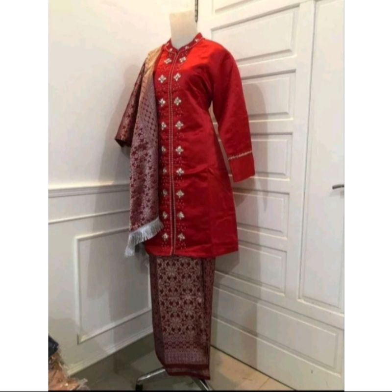 Baju basibah kurung minang kabau