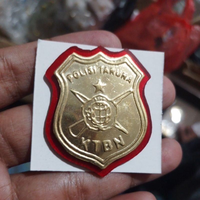 pin polisi taruna stpn KTBN