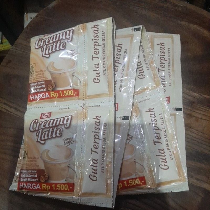 

KOPI TORA BIKA CREAMY LATTE 10 saset@25 GR exp agust 2024