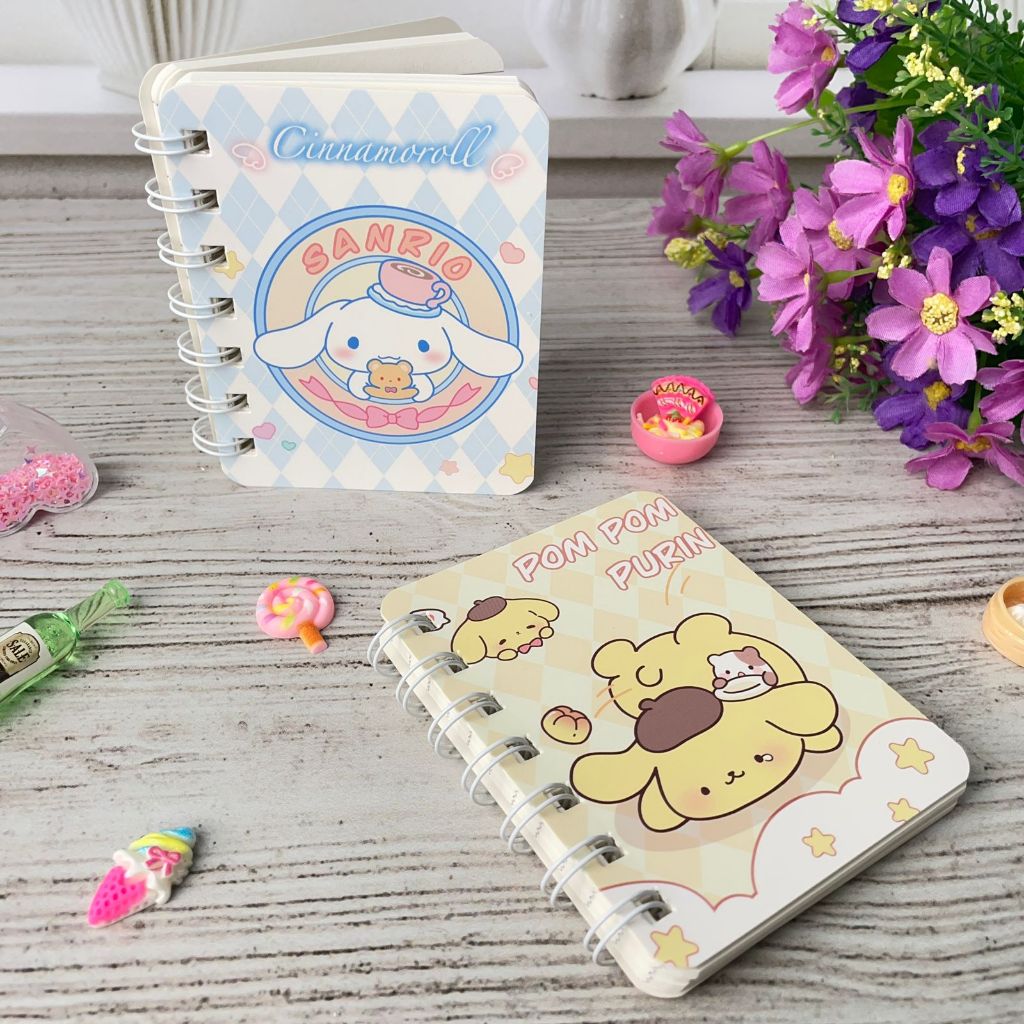 

BUKU NOTEBOOK SPIRAL SANRIO UKURAN A7 BK-1104 notebook saku mini cover kartun family buku catatan spiral purin cinnamon roll viral kekinian