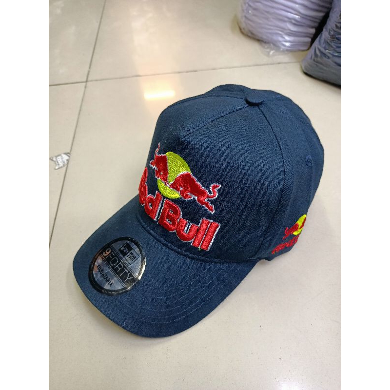 topi red bull NLB
