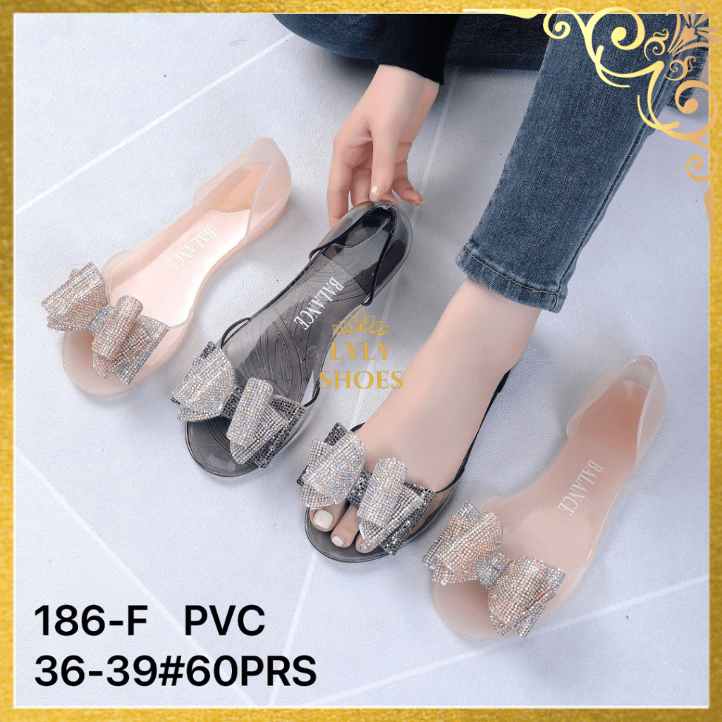Sandal Jelly Wanita Slip On Balance Transparan Motif Pita 186-F