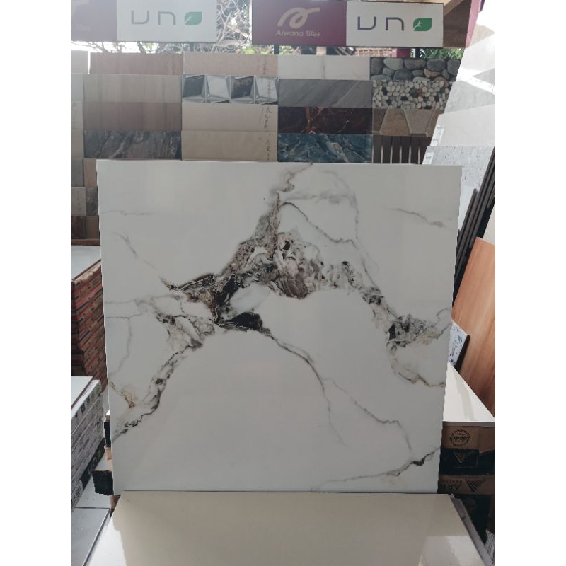 Keramik Cutting 50x50 Merk Uno Mourice White semi granit