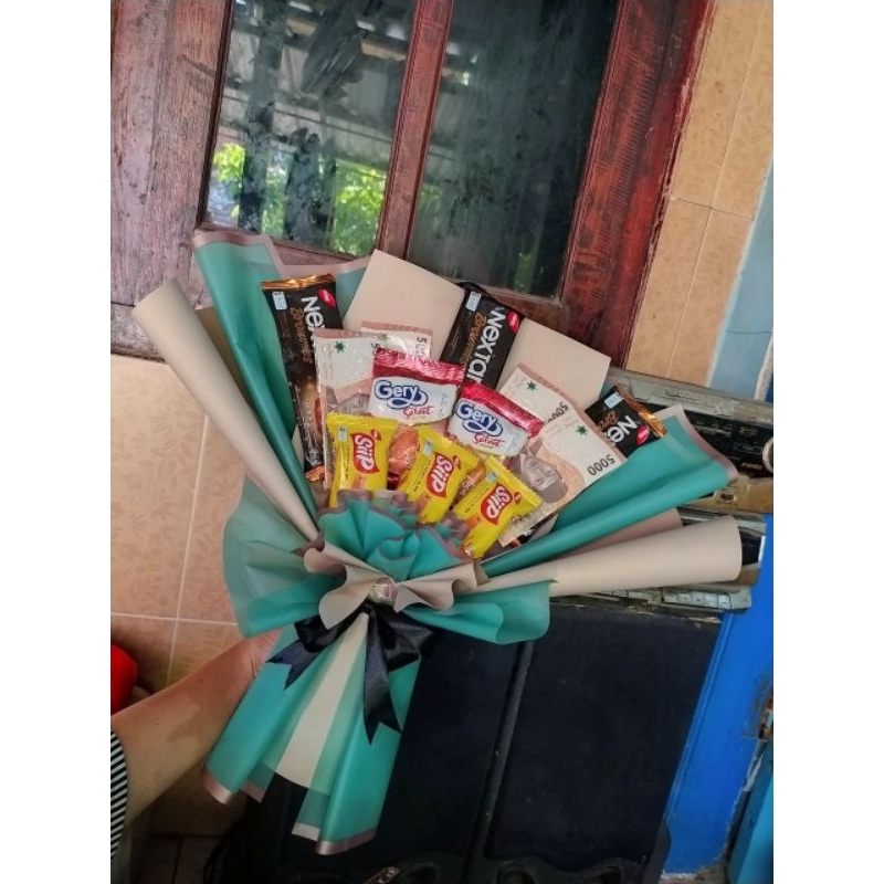 

Buket snack dan uang