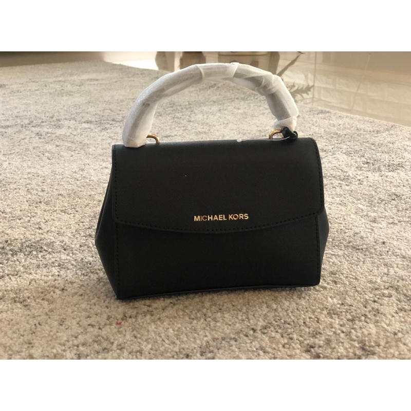 mk ava xs black/brown