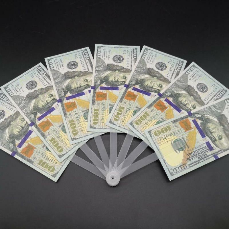 kipas uang berbentuk dollar