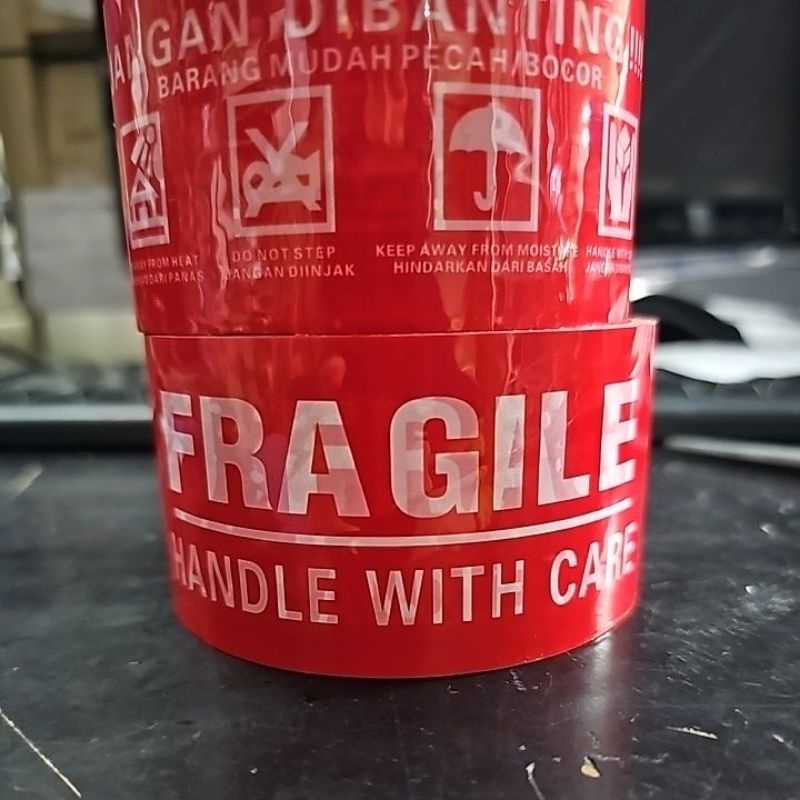 

Lakban fragile untuk packing warna merah
