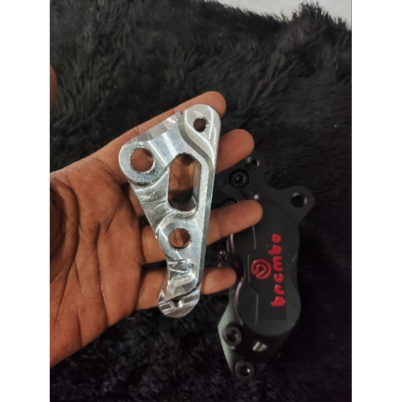 breket kaliper 4p supra/wave 125 disc 220mm